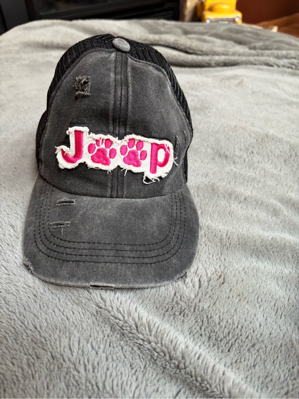 Women’s Jeep Black Trucker Hat with Pink Paw Logo
